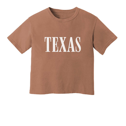 burnt orange crop t-shirt with texas in large letters across the front